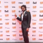 Antony Varghese Instagram - Dreams do come true! #Jallikkattu was premiered at #TIFF last night .So many people to thank for giving me this incredible opportunity, @lijo_lebowski chettan for the immense trust in me, @chembanvinod chettan for always being there for me and all the cast and crew of #Jallikkattu so proud of you all! Thank you God and the Universe I believe for taking care of me! Wearing @tubazafir PR: @bigbannertalents