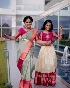 Arya Instagram - Not just my sister … my DAUGHTER .. my FIRST BABY… my BABY GIRL …. @anjanasatheeshps 

Our Sarees @kanchivaram.in 
Our styling @sabarinathk_ 
Our MUA @sijanmakeupartist 
Our blouses @aroya_by_arya_resmi 
Event by @eventiaevents 
Photography @weddingelementsphotography 
Mehendi @salihashamnad 

#bride #keralabride #keralaweddingstyles #weddingphotography #trending #mysister #herbigday #dreamcometrue