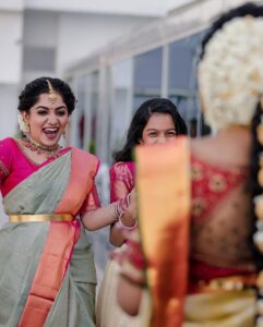 Arya Instagram - Not just my sister … my DAUGHTER .. my FIRST BABY… my BABY GIRL …. @anjanasatheeshps 

Our Sarees @kanchivaram.in 
Our styling @sabarinathk_ 
Our MUA @sijanmakeupartist 
Our blouses @aroya_by_arya_resmi 
Event by @eventiaevents 
Photography @weddingelementsphotography 
Mehendi @salihashamnad 

#bride #keralabride #keralaweddingstyles #weddingphotography #trending #mysister #herbigday #dreamcometrue