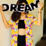 Deepa Thomas Instagram - The one word which keeps me going ! #dream ❤️ Customized cushion : @dishum_giftings Shirt : @zivens.in Pic credits : @anarkali_nazar 🤍 Btw , it’s a temporary hair straightening 😛 SFS Airport Royale