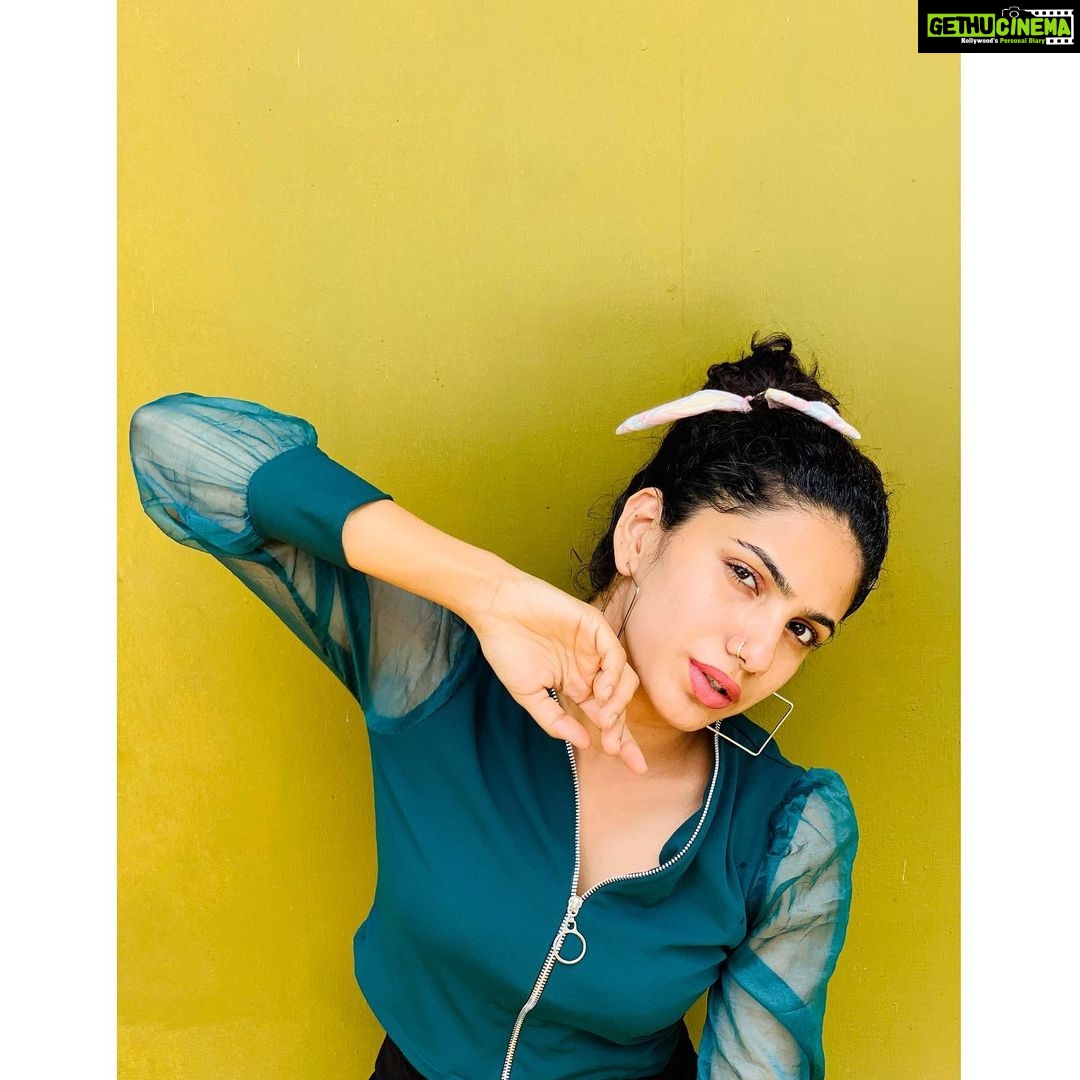 Deepa Thomas Instagram - Confusion that never stops The closing walls and the ticking clocks gonna Come back and take you home I could not stop, that you now know, singing Come out upon my seas Cursed missed opportunities am I A part of the cure Or am I part of the disease, singing You are, you are... #Clocks ⏰ #coldplay #addicted ✨ Green top : @reasonable_closet ❤️ Scrunchie : @kanoaofficial❤️ 📸 : @ashley__kurian #photoshoot #collaboration #jeantop Wayanad- The palace of Natural Beauty.