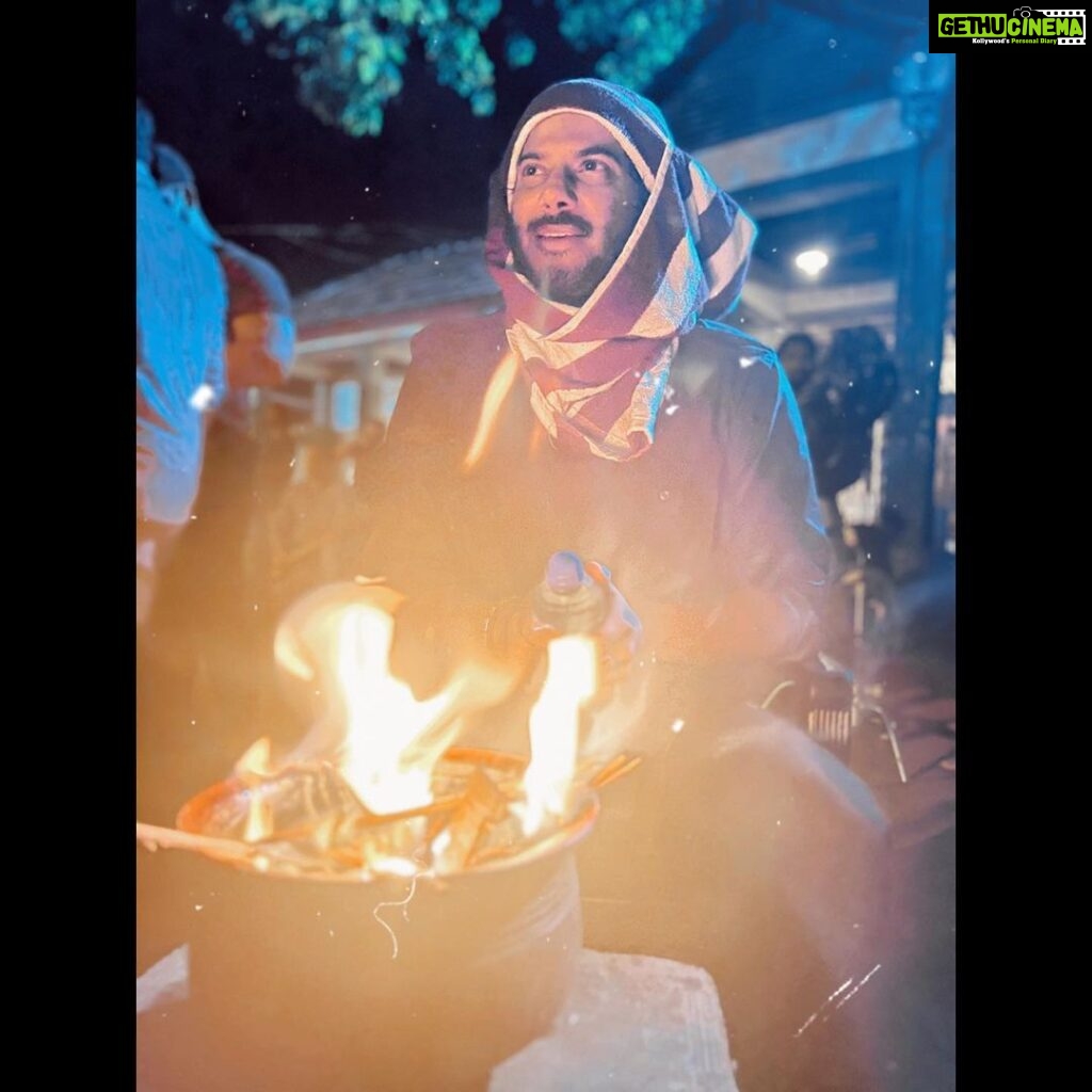 Dulquer Salmaan Instagram - Night shoots ✅ Rain Effect ✅ Unwell ✅ Trembling ✅ Bundled Up ✅ Make-Shift Hot WaterBottle ✅ Make-shift Mini Bonfire ✅ 2 hour 🚙 to catch a 9 am ✈️ for next shoot ✅ 🧟‍♂️ ✅ #dontstopwontstopcantstop #everydayimhustlin