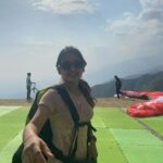 Esther Anil Instagram - 📝 Sky above and a beautiful valley below ☁️🍃🏔 Jumped from a mountain, world's second highest paragliding point towering at 8,000ft and wohoo!! Cried a little inside (maybe a little outside too 😂) but it was all worth it. ⛅️♥️ Second picture says it all… Eeeee.. cus nervous and excited 😆🕺🏽 📍 Bir Billing #Paragliding #BirBilling #traveljournal