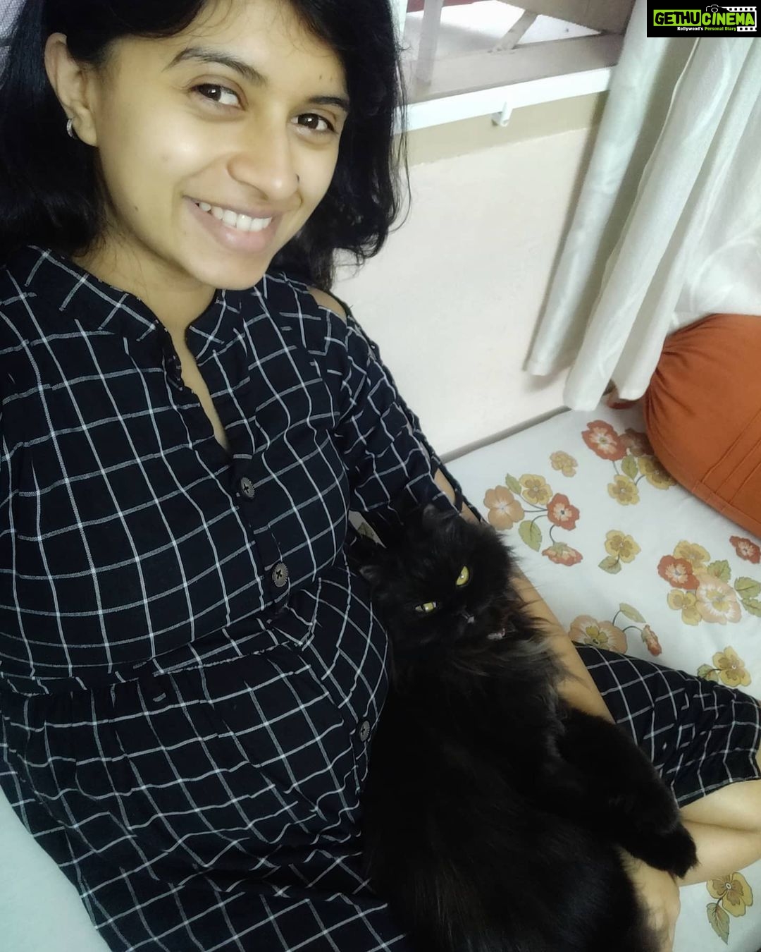 Harija Instagram - My second trimester story with zuzu... I took this pic when I was six months pregnant.... I still remember how my cat(my daughter zuzu) was so attached towards me ... It seemed lik she was protecting me and the baby...and I understood something from her behaviour .. nothing should stop me from caressing her...... Becoz that is what she s expecting ... Unconditional love from me ... Even when the baby comes she will have the same attention I had given her before... To be honest she was a big support mentally for me... Her purring soothes me... When she plays with me I just forget all the stress that was not letting me see things clearing .... Having a pet or pets in your life is a gift that u bring for yourself in ur life... I have 2 more cats and 2 dogs in ma home town who have made me feel the same way... They are my family and families stand with u during ur tough period... And they did justice to that line❤️ my lovables will soon upload pics with the rest of my pets Note - I'm not biased over cats ... My intention here is to explain pets and their behaviours.. no matter which animal u have .... It's all the same when it comes to love😘 #pet #petlovers ylove