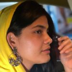 Kalpika Ganesh Instagram - Thank you @photographyby.e.a for this cute blingy ear ring #hoodie #yellow #earrings #hanging #bindi