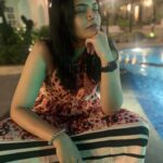 Kalpika Ganesh Instagram - Open or closed eyes I always keep speaking #random #poolside #candid #phoneclicks #iphonexr #noedit #nofilter #nosering Amritara Aura Goa