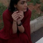 Kalpika Ganesh Instagram - Goes with out saying the music dragged me to make a reel sooner Wardrobe @sr_lable_by_yaminireddy Make up and hair @makeupbykrishnaveni 📸 @karteeksivagouni #phonecapture #silouettechallenge #sunset #roadside #red #dangles #reels2021