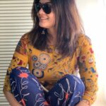 Kalpika Ganesh Instagram - Sometimes it’s just that one smile or smirk that can make a difference🧡🤎 #candids #rayban #phoneclicks #shotoniphone