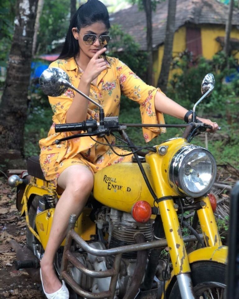 Kalpika Ganesh Instagram - Either Pose Or be Poised #candidclicks #mvgv #royalenfield #yellow #phoneclicks #appleiphone #selfmusings