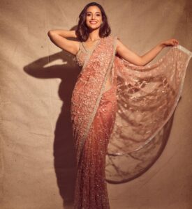 Meenakshi Chaudhary Instagram - On my best behaviour 😝 for my first ever @siimawards . Had the best experience ♥️ And a shoutout to my dream team for making me look like a dream ✨✨🙈♥️ 📸 : @gohil_jeet Outfit: @dlmayaofficial Stylist : @riechamallick Make up : @aruusmakeup Hair : @hitakshijain3