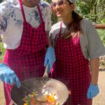 Nakshathra Nagesh Instagram - Who would have thought? Raghav and I have never cooked a meal together and @sarova_hotels managed to make us do this in MasaiMara which is a memory we will cherish forever ❤️ The fact that we cooked using fresh produce from their big organic garden was definitely a bonus! One thing I can tell you all is, Kenya is magical and it will surprise you in more ways than one. Thank you @pickyourtrail for planning the best holiday for us 🇰🇪 #NakshathraInKenya #TheSarovaExperience #SarovaCares #PickYourTrail #UnwrapTheWorld