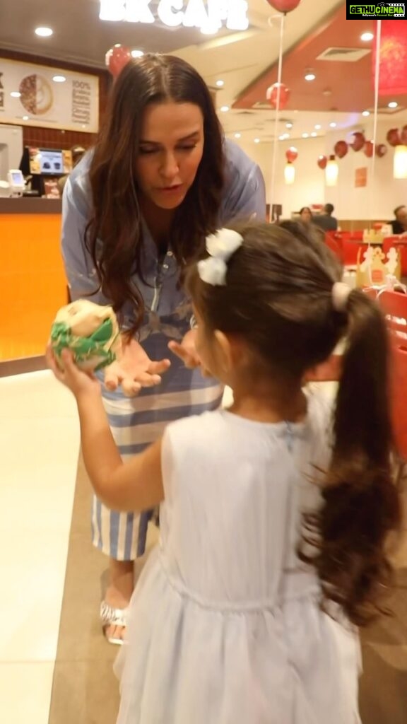 Neha Dhupia Instagram - Children’s Day celebrations with my girl at a Burger King restaurant turned out to be so much fun!!! Our afternoon siesta was made up of some heart to heart conversations over burgers, fries, shakes, coffee & crowns and we’re ready to seize the day now 😜😜😜 @burgerkingindia #ChildrensDayWithBurgerking #BKCAFE #KingIsHere Aligned by @pricision.in 📹 by @dreams2reels