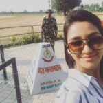 Nikita Dutta Instagram - Just when the sun decides to set down for the day, two neighbors display immense zeal for their respective countries turning an infinite crowd as patriotic as they can ever be. This ceremony leaves you in awe of the forces, geography and the zest of the people. The feeling of Taking a walk along the boundary and being two steps away from it is a priceless one. So glad to have got to experience this. #BorderFeels #IndoPak Attari Indo-Pak Border