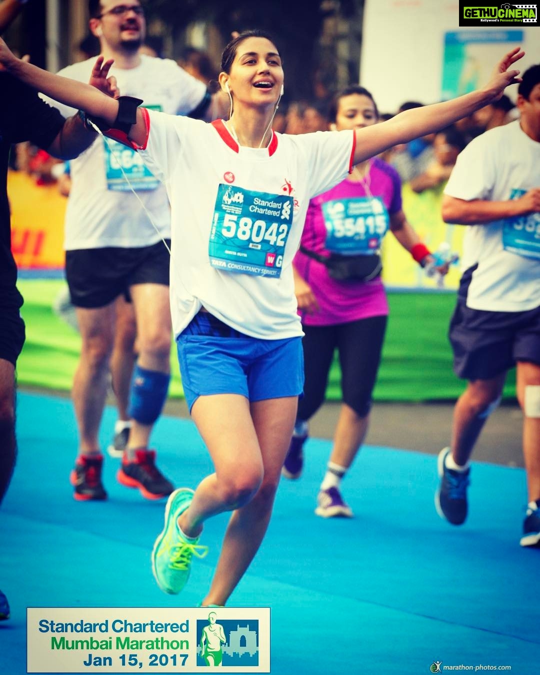 Nikita Dutta Instagram - Trying really hard to smile since I was alarmed about candid pictures being clicked at the finishing point! #SheerHappiness #SCMM2017 #HalfMarathon