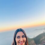 Nikita Dutta Instagram – Tried to match colours with the sunset 💛🧡❤️ 
.
.
.
📸: @vardhanpuri02 Pão De Açucar – Sugar Loaf Mountain