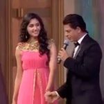 Nikita Dutta Instagram - Year 2015, my first show was being launched at an award show. You were the main host and were to introduce my co star and me. We were called earlier on the main day to rehearse with you. I remember being asked how I was feeling about sharing the stage with “shah rukh Khan”! While we stood waiting in front of the stage watching you rehearse, I was quite blank in my head! You called us over to the stage and said, “I apologise to make you guys wait, give me sometime, we shall rehearse in my vanity”. A while later we were called to your van. There was an army of people sitting and going over the show’s script with you. You got us seated inside, and we began rehearsing our part with you. You beautifully added your quirks, made us comfortable and assured how you would handle it even if we got really nervous and didn’t know what to do. Those 30 minutes were quite mesmerising to be sitting in your van at that moment and having a conversation with you. Before leaving we managed to get a picture with you which was already the highlight of our evening. Then came showtime! By now a lot of nervousness had kicked in. While we were waiting backstage on one side, a crew member hurriedly came and called us to the other side saying you wanted to see us. We hopped and jumped through an uneven backstage to come there and you asked if we wanted another quick rehearsal. By now I was a lot in awe of watching your process of preparation. This quick rehearsal did bring our nervousness down by a decent percentage! On stage you conducted our part so beautifully to cover up for our excited and shivering nerves! It was a huge happy relief as we got done and everything went great! Though this didn’t end here. While the show wrapped up and I was waiting outside the red carpet for a channel incharge, you were exiting the place with your security and entourage. You took a detour, walked towards me and said, “I wish you all the best Nikita. I hope your show does wonders.” And after this as you walked away, I knew I was an admirer for life. . Most people who have ever met you, have an #SRKstory . This is mine. Happy birthday @iamsrk 💕💕