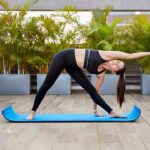 Nikita Dutta Instagram - #Trikonasana or the #ExtendedTrianglePose featuring on #SaturdayStretches today! . Strengthens and stretches inner thighs, groins, hamstrings, calves, shoulders, chest and spine. Also quite therapeutic for flat feet (saying it with personal experience 😇). Avoid Incase of lower back problems. . #Yoga #Flexibilty #Stretch