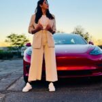 Pooja Jhaveri Instagram - If your style is classy and playful both ! Here is the perfect choice for you… ! The very classy Tesla Model 3. The midnight cherry red colour is classy and playful. The new version of Tesla Model 3 is awaited in 2023 and I cannot wait to get my hands on it ! @teslamotors Because classy and playful, yes it me ! Song : @ap.dhillxn #tesla #teslamodel3 #teslacars #cars #car #carlovers #blogs #vlogs #teslalife #electriccar #electriccars #influencer #ootd #apdhillon #allnight #apdhillonsongs #reels #reelitfeelit