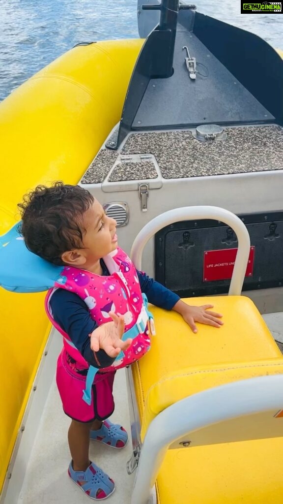 Pooja Kumar Instagram - It started raining on the boat so my little girl decided to sing to the rains - rain rain go away come again another day. #singing #kids #daughters #hawaii #honolulu #vacation #islands #water #america #india