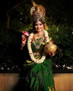 Punnagai Poo Gheetha Instagram - ❤️Goddess Lakshmi ❤️
Goddess Lakshmi denotes that Sakthi or energy of the divine that assist you in achieving your pure desires, which are without any greed, or reference of the past and future, and completely rooted in the present moment. 

Credits:
Concept & Photography by @marsk_production 
Produced by – @marsk_production & @pervinraj
Talent – @punnagaipoogheetha (Goddess Lakshmi) 
Posing direction by- @shivagamimarimuthu
MUA/Hairstylist– @feminabridal.mkup
Saree – @vimlasboutique1456
Accessories – @vehaaraarts (Crown), @feminabridal.mkup (Jewels), @megalagoldcovering
Garlands- @apsweddinggarlands
Saree Blouse – @durshanthini
Caption by – @marskproduction