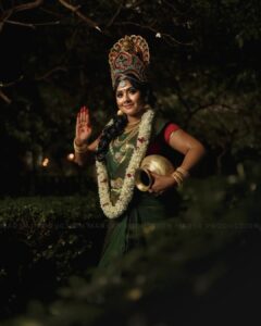 Punnagai Poo Gheetha Instagram - ❤️Goddess Lakshmi ❤️
Goddess Lakshmi denotes that Sakthi or energy of the divine that assist you in achieving your pure desires, which are without any greed, or reference of the past and future, and completely rooted in the present moment. 

Credits:
Concept & Photography by @marsk_production 
Produced by – @marsk_production & @pervinraj
Talent – @punnagaipoogheetha (Goddess Lakshmi) 
Posing direction by- @shivagamimarimuthu
MUA/Hairstylist– @feminabridal.mkup
Saree – @vimlasboutique1456
Accessories – @vehaaraarts (Crown), @feminabridal.mkup (Jewels), @megalagoldcovering
Garlands- @apsweddinggarlands
Saree Blouse – @durshanthini
Caption by – @marskproduction