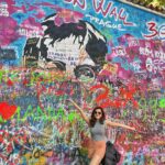 Shirley Setia Instagram - Out & about at the Charles Bridge & John Lennon Wall in #Prague 💛 #shirleytravels #travel #shirleysetia #czechrepublic Prague, Czech Republic