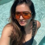 Shonali Nagrani Instagram - Dear sunshine, water and foliage..... I surrender. Do your thing :) #nature #poolside #pool #versace #swimsuit #swimwear #goa #sunshine #glow #swimming