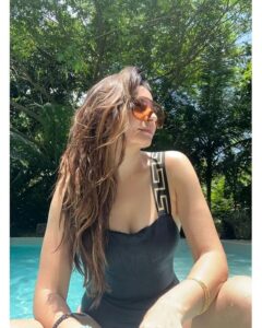 Shonali Nagrani Instagram - Dear sunshine, water and foliage..... I surrender. Do your thing :) #nature #poolside #pool #versace #swimsuit #swimwear #goa #sunshine #glow #swimming