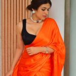 Shraddha Das Instagram – Diwali 🪔 in a @laevachi saree🧡
Jewellery : @the_jewel_gallery 
Bag : @eena.official 
Styling : @thewandermannequin @artbyavnee 
📸 @snehzala 

#diwali #sareelove #shraddhadas Mumbai, Maharashtra