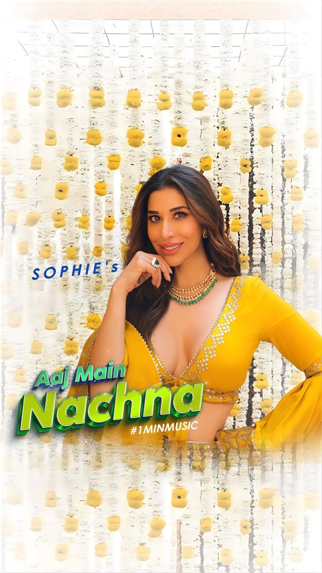 Sophie Choudry Instagram - Aaj Main Nachna is here to win your heart & make you dance this shaadi season!! Need your love for my first ever #1MinMusic 💕 #aajmainnachna #weddingsong #mehndi #trendingsong #sophiechoudry A huge thanku to this incredible team behind the song and video!! Creative director & Editor @adityabhansali_ Co director/EP @siddhant_singhvi @storytellers_management Choreographer @yasshkadamm Location @one8.commune @suved Composer/lyricist @manisha_ojha_ram Producer/Arranger @gosavimontu Rhythm arrangement @hanifaslam_official Recorded by @rhsharma504 Mixed and Mastered by @tosiefshaikh HMU @divyachablani15 @tinamukharjee Styled by @mohitrai with @shrey_vaishnav_ Look 1 Outfit @gopivaiddesigns Jewellery @curiocottagejewelry Look 2 Outfit @svacouture Jewellery @motifsbysurabhididwania Look 3 Outfit @itrhofficial Jewellery @karishma.joolry Art director @_eye.for.beauty_ Dancers styling @styled.by.urvi Special thanks to @aachho @dinky_nirh Dancers @chinmayee19 @__sakshi2204 @alyonaatalukdar_thedancer @ishasawant_ @aankitaguptaa Poster design @hslstudios (Samdish Sandhu)