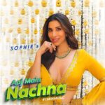 Sophie Choudry Instagram - Aaj Main Nachna is here to win your heart & make you dance this shaadi season!! Need your love for my first ever #1MinMusic 💕 #aajmainnachna #weddingsong #mehndi #trendingsong #sophiechoudry A huge thanku to this incredible team behind the song and video!! Creative director & Editor @adityabhansali_ Co director/EP @siddhant_singhvi @storytellers_management Choreographer @yasshkadamm Location @one8.commune @suved Composer/lyricist @manisha_ojha_ram Producer/Arranger @gosavimontu Rhythm arrangement @hanifaslam_official Recorded by @rhsharma504 Mixed and Mastered by @tosiefshaikh HMU @divyachablani15 @tinamukharjee Styled by @mohitrai with @shrey_vaishnav_ Look 1 Outfit @gopivaiddesigns Jewellery @curiocottagejewelry Look 2 Outfit @svacouture Jewellery @motifsbysurabhididwania Look 3 Outfit @itrhofficial Jewellery @karishma.joolry Art director @_eye.for.beauty_ Dancers styling @styled.by.urvi Special thanks to @aachho @dinky_nirh Dancers @chinmayee19 @__sakshi2204 @alyonaatalukdar_thedancer @ishasawant_ @aankitaguptaa Poster design @hslstudios (Samdish Sandhu)