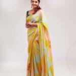 Tanvi Ram Instagram - I am all about the yellow today💛 Photographer - @arun_payyadimeethal Stylist - @amritha_lakshmi___ Saree : @saltstudio Blouse : @corbonbespoke Jewellery :@dehab_bridals