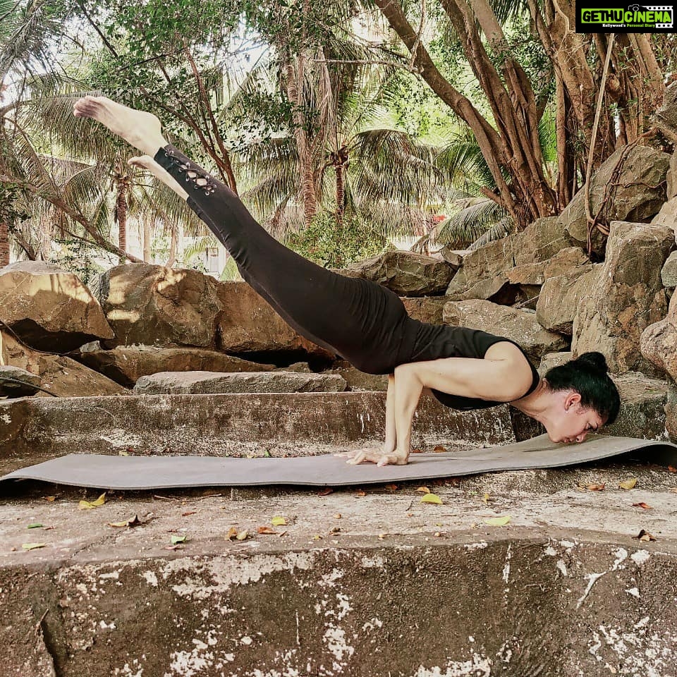 Tina Desai Instagram - Peacock pose. It's funny how it looks nothing like a peacock. #fitnessfriday #yogaontherocks #lockdowndiaries