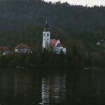 Tina Desai Instagram - Castle Bled on the cliff, and the Assumption of Maria church on a little island on the famous Lake Bled (accessible by lil boats), wrapped around by the Julian Alps.😍😍😍 #slovenia🇸🇮