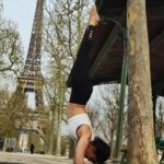 Tina Desai Instagram - My legs are as long as the Eiffel Tower 😉🎉💥 #pinchamayurasana #forearmhamdstand #yogaattheeiffeltower #fitnessfriday