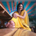 Amala Paul Instagram - Carrying a bit of sunshine with me. 🌞🌻 Outfit: @t.and.msignature Tight hugs dear Tiya for the outfit! 🤗👗 Jewellery: @m.o.dsignature 💍💎 #ootd #athome #sunshine #yellow #indianootd #ethnic #amalapaul Home Sweet Home