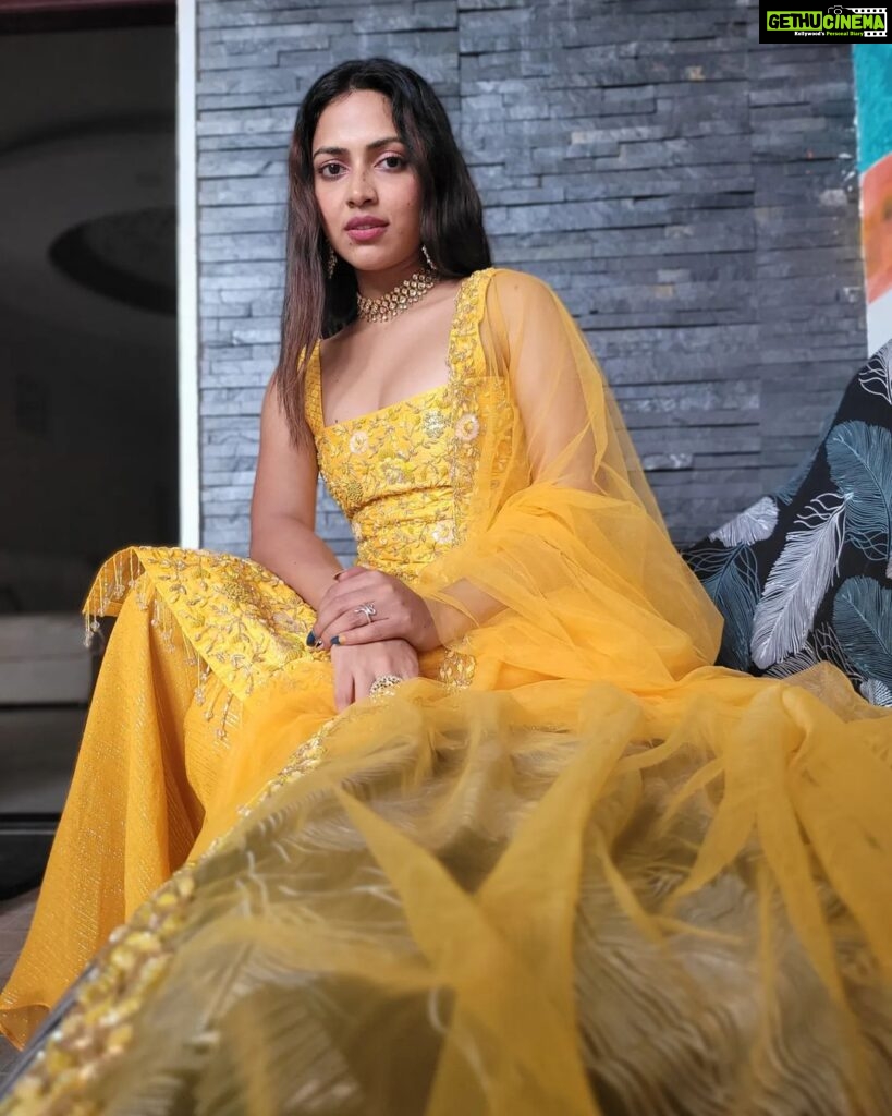 Amala Paul Instagram - Carrying a bit of sunshine with me. 🌞🌻 Outfit: @t.and.msignature Tight hugs dear Tiya for the outfit! 🤗👗 Jewellery: @m.o.dsignature 💍💎 #ootd #athome #sunshine #yellow #indianootd #ethnic #amalapaul Home Sweet Home