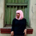 Angana Roy Instagram - Imma call her Candace. Picture and wig courtesy @nehasharmma :P 💜 Beautiful hoop earrings by @rubibyritika #candyflosshair #candace #pinkwig #aesthetic #artsy #wednesdayvibes #wednesdaypost #wigs #funk #oldwindows #igfashion #randomclick #chic #sorandom #blackpink #windows #pinkhair #candyshop #catsofinstagram #kolkatagram #haircolor