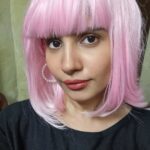 Angana Roy Instagram - Imma call her Candace. Picture and wig courtesy @nehasharmma :P 💜 Beautiful hoop earrings by @rubibyritika #candyflosshair #candace #pinkwig #aesthetic #artsy #wednesdayvibes #wednesdaypost #wigs #funk #oldwindows #igfashion #randomclick #chic #sorandom #blackpink #windows #pinkhair #candyshop #catsofinstagram #kolkatagram #haircolor
