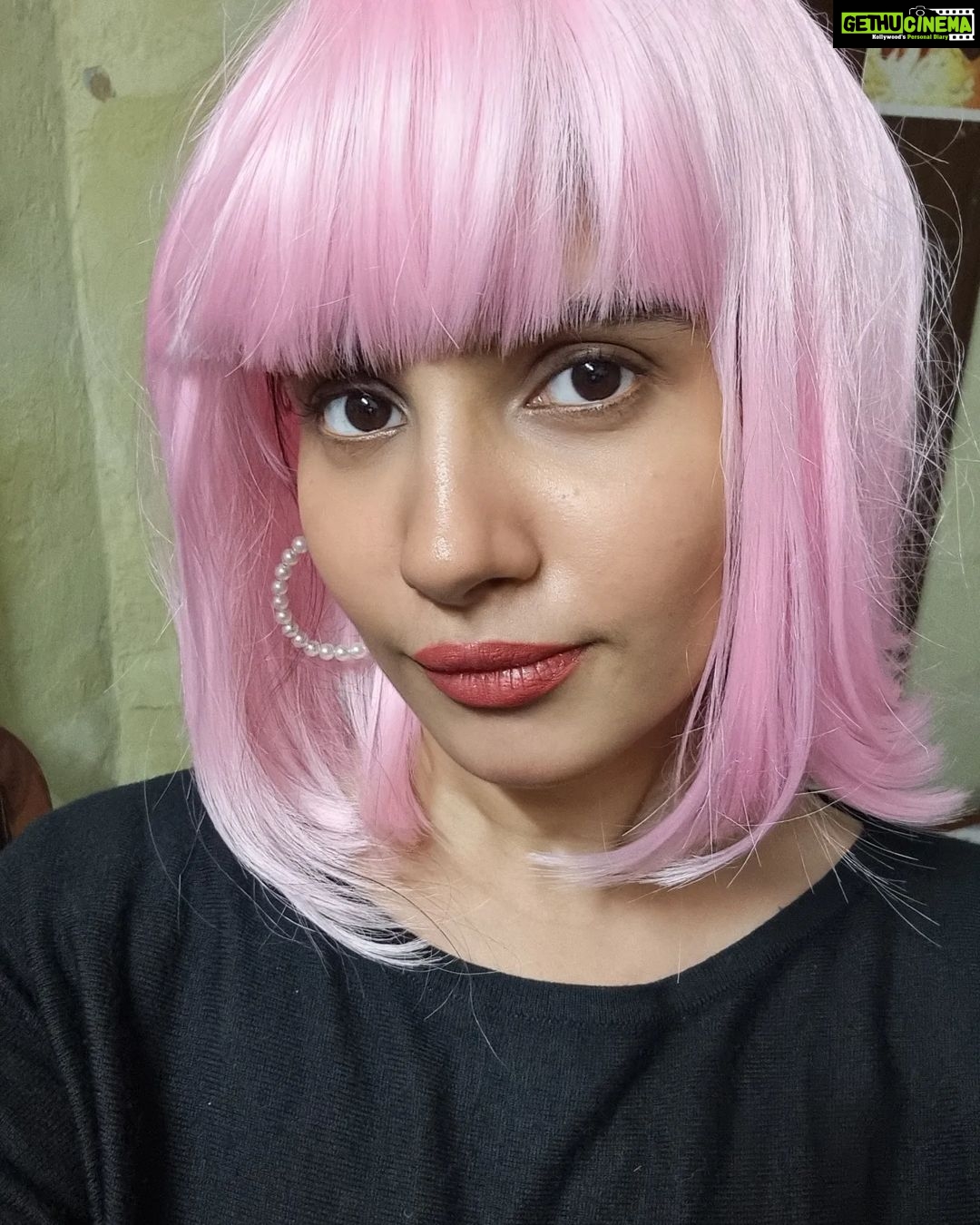 Angana Roy Instagram - Imma call her Candace. Picture and wig courtesy @nehasharmma :P 💜 Beautiful hoop earrings by @rubibyritika #candyflosshair #candace #pinkwig #aesthetic #artsy #wednesdayvibes #wednesdaypost #wigs #funk #oldwindows #igfashion #randomclick #chic #sorandom #blackpink #windows #pinkhair #candyshop #catsofinstagram #kolkatagram #haircolor