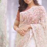 Anju Kurian Instagram - Do you think time moves in one direction and memory in another? #instamood #reelsinstagram #wednesdays #sareelove #thoughtful #happymoments #memorableday #reelitfeelit #justories #anjukurian #dailylook #sareelover #naturegram