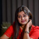 Ansiba Hassan Instagram - Girl 👧 in red ❤️. Styling @jishadshamsudeen PC @imagiophotography_official #ansibahassan #actress #mollywood