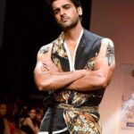 Arjan Bajwa Instagram - Run if can, walk if you have to, crawl if you must ..just NEVER GIVE UP !!. .. . . . . . . . . . . . #instadaily #instagood #instagram #instamood . . . . #actorslife #black #bollywood #photography #haircut #menstyle #menshair #mensfashion #ramp #runway #runwaymodel #attitude #style #designer #lifweek #priakataariapuri @priakataariapuri ‘s fantastic design collection called #persianpunk #persian #designerclothes #tattoo #tattooideas #rampwalk @willslifestyle @lakmefashionwk #kabirsingh