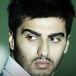 Arjun Kapoor Instagram - Always a pleasure to meet and shoot with the inimitable @avigowariker! This time he made me walk down the memory lane with my first and most special photoshoot even before my debut film @yrf’s #Ishaqzaade!! Nostalgic and grateful (wore a lot of free pieces from @kunalrawaldstress for this shoot 😂) #workinprogress #MondayThrowback 🧿🙏