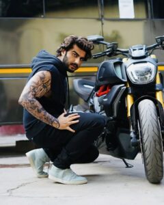 Arjun Kapoor Instagram - For me, tattoos are a form of expression and I love it! It’s cool, sexy, beautiful and I dig it. I have always wanted to sport tattoos in my films and it is not a secret that I love tattoos deeply. For me, they are always personal. I’m always hunting for cool designs and talking to people about what my next one will be. So, Ek Villain Returns was an amazing project for me because I got to sport such insane tattoos that define my character and personality in the film. Getting inked holds a different meaning for everyone, for me it was always about imprinting a part of your soul on to your body. With this film, I can safely say that I have been reunited with my love for body art and I thank Mohit Suri for covering me with tattoos that I will cherish forever. I already have 3 tattoos. Time to maybe get 1 more.