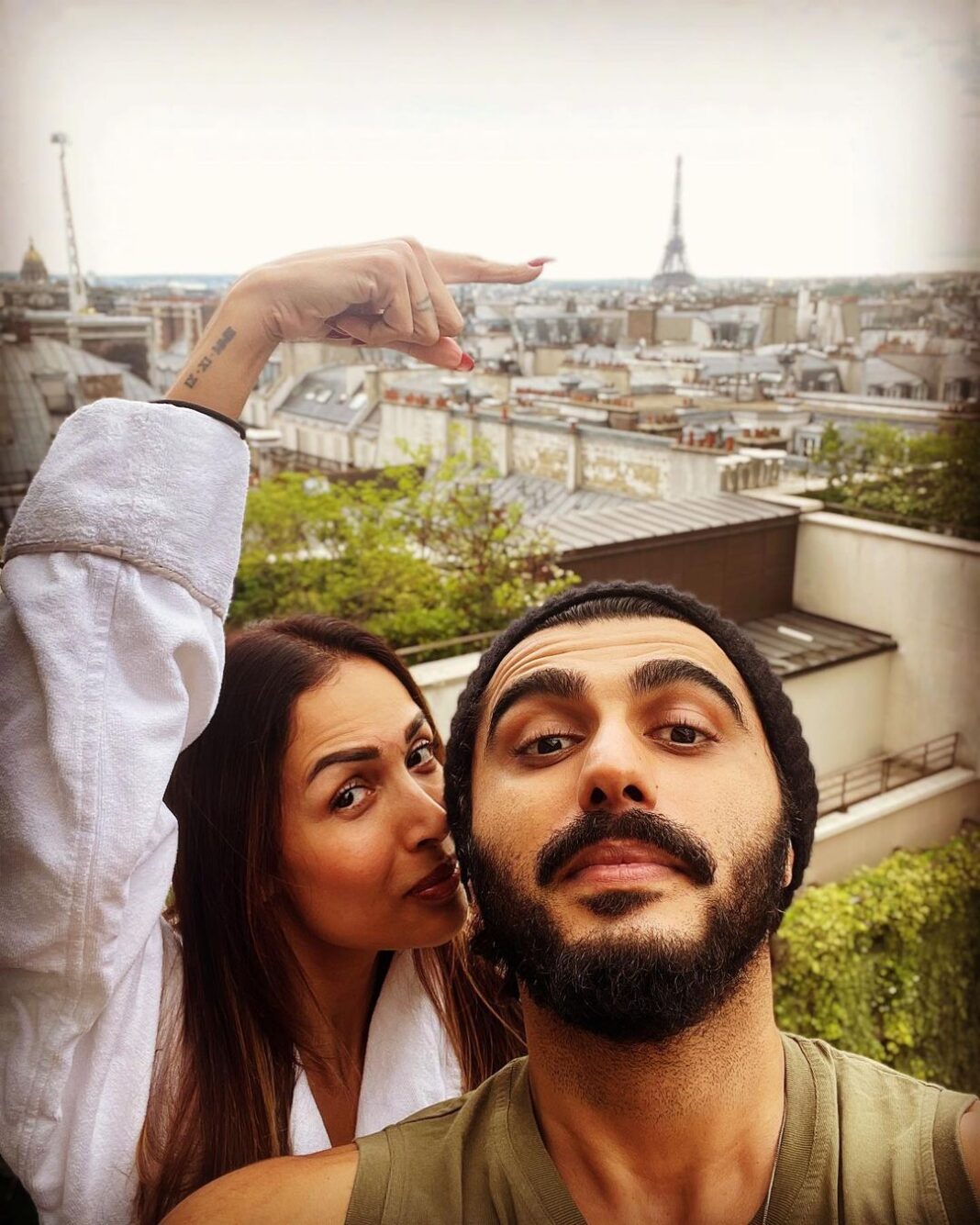Arjun Kapoor Instagram - Eiffel good... I knew I would... @malaikaaroraofficial #parisvibes Rue Saint-Honoré