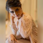 Ashika Ranganath Instagram - For #Madhagaja pre release event Styling @tejukranthi Outfit @anyracouture Make up @urjapatel_artistry Hair @makeover_by_raghu_nagaraj_n Photography @_trip_lenz_ @triplenz_fashionphotography Taj West End, Bengaluru