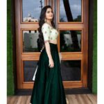 Ashika Ranganath Instagram - Wearing @shradhaponnappaofficial after a very long time 🌸 in love with this bottle green skirt n pastel blouse. @suprithshekar 📸 best friend itseems 🤷‍♀️