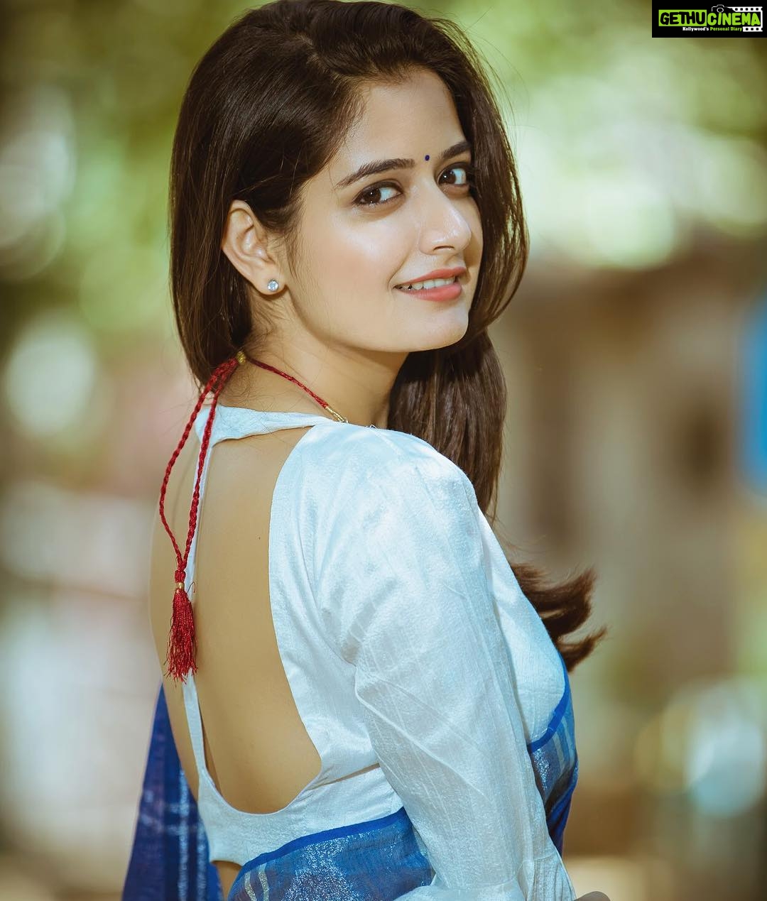 Ashika Ranganath Instagram - Favourite from the series ❤️ Thank you @raaghavphotography for these amazing pictures 😍 Silver choker by @studiobluefashions Raw silk ruffle sleeve blouse by @shravin_design_studio