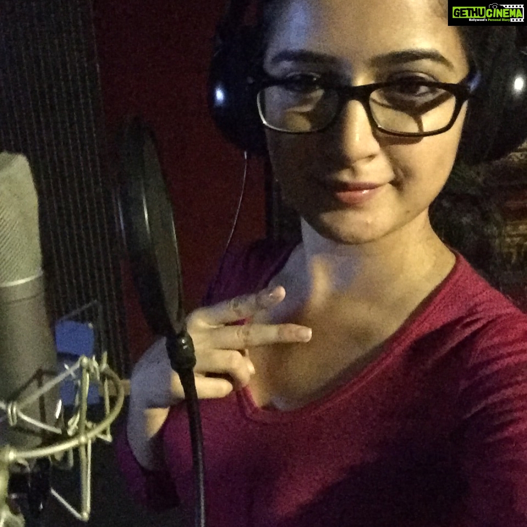 Ashika Ranganath Instagram - Finished dubbing for my cute lil role in #rajukannadamedium ..loved playing it 😍 hope you'll will like it 🙈 #gurunandan #Ashika